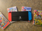 Nintendo Switch oled console with games 2P69