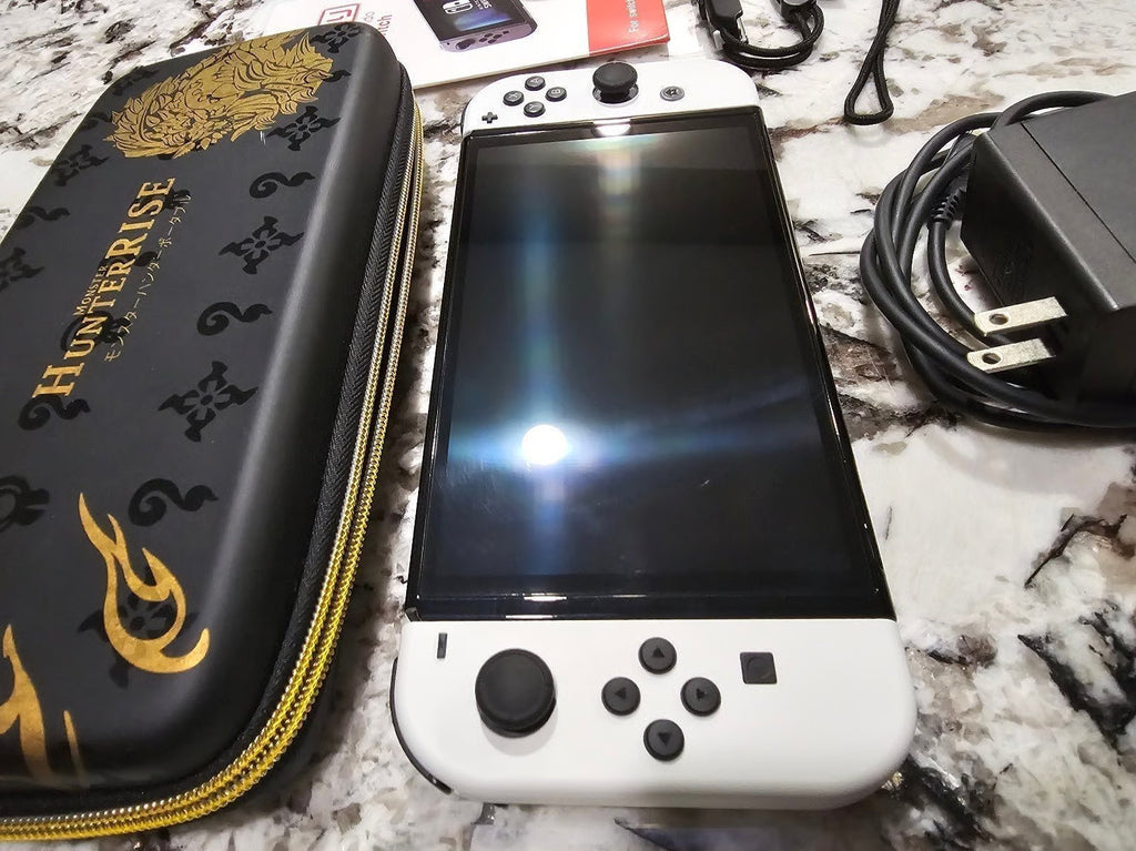 Nintendo Switch OLED + Case and Accessories! 9M73