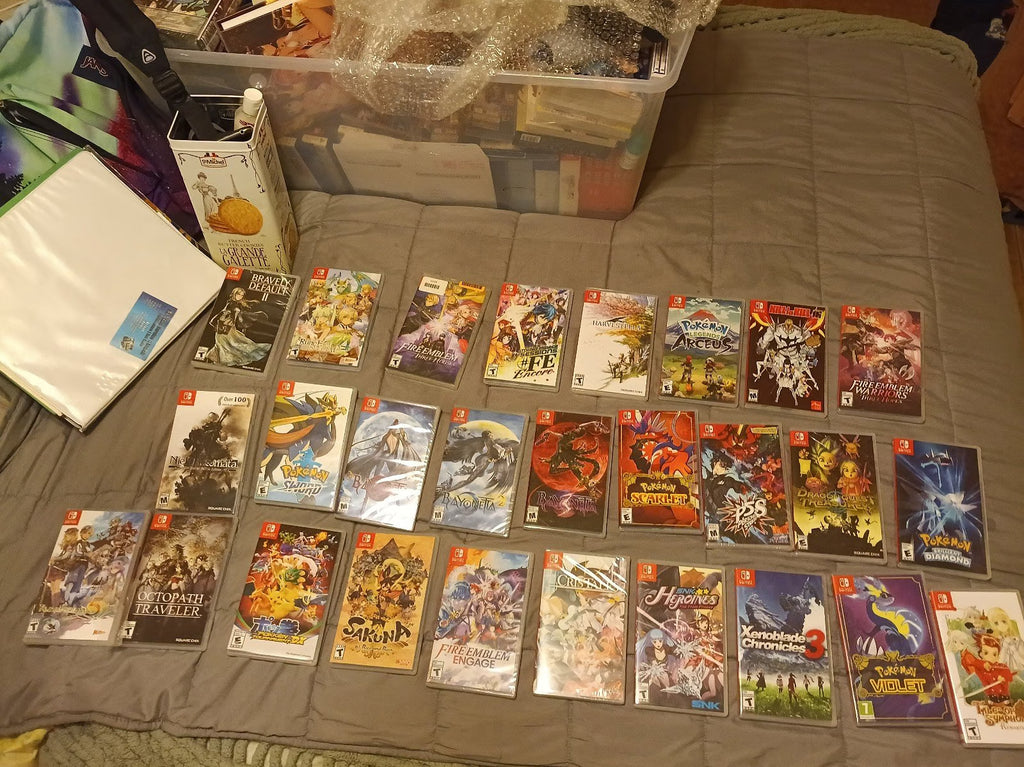 Nintendo Switch oled (new unopened and 28 games) 3C21