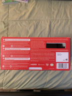 Barely used Nintendo Switch OLED with games travel case and extra controller 3K57