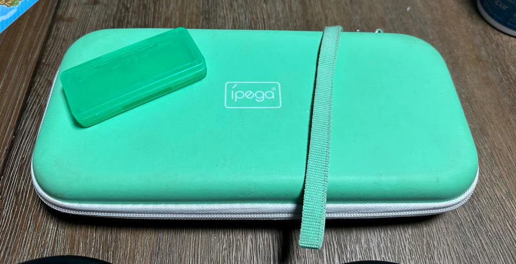 Nintendo Switch OLED w/ PasNintendo Switch OLED w/ Pastel Joy-Cons & Accessories 8W12