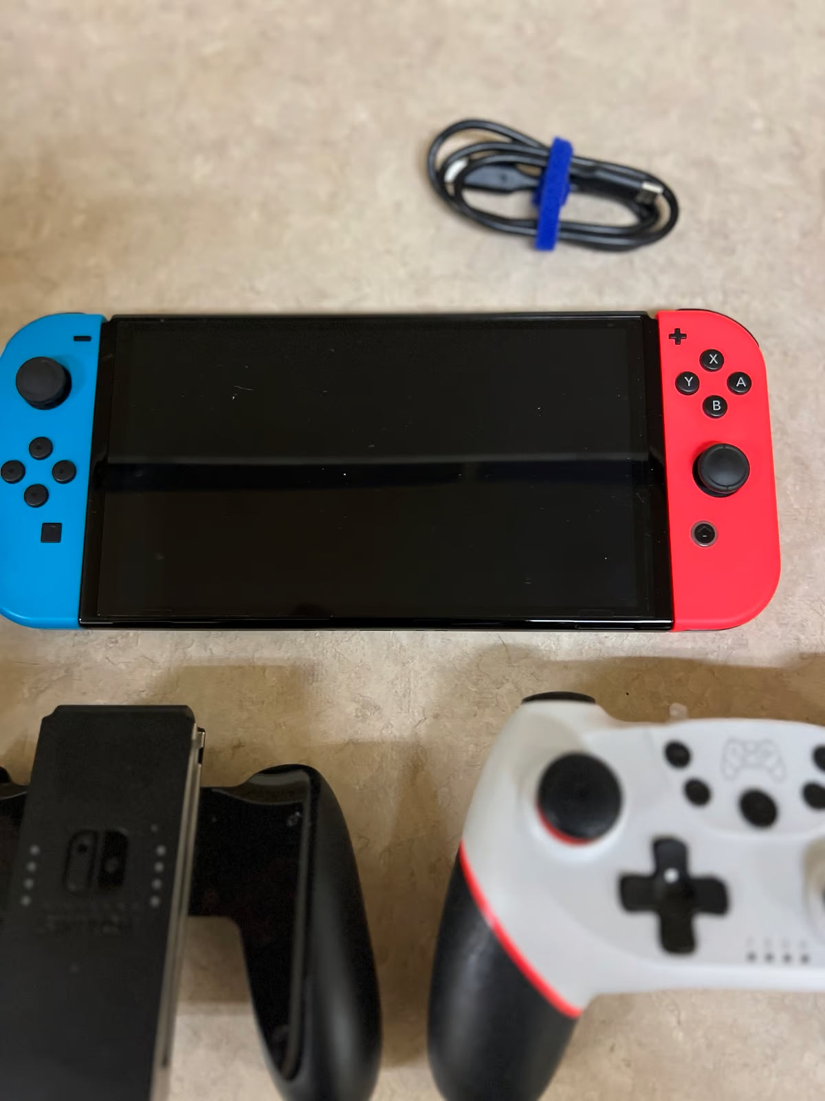 Nintendo switch oled bundle w/2 BRAND NEW WIRELESS CONTROLLERS 2K81