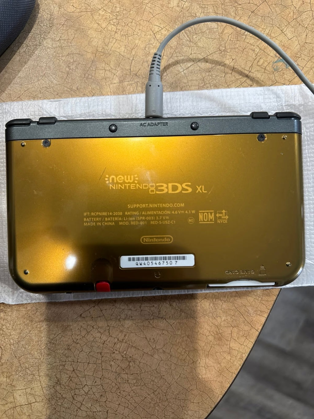New Nintendo 3DS XL Hyrule Edition with Nintendo Charging Cable (Barely Used)