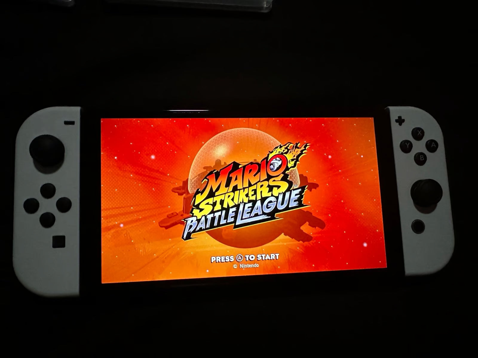 Nintendo Switch Oled White Comes With Mario Strikers and Ring Fit Adventure 9J58