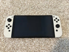 Nintendo Switch 鈥?OLED Model w/Joy-Con & 8BitDo - 8BitDo controller 9L75