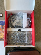 Nintendo switch oled with games (New Condition) 9C65