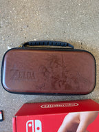 Nintendo switch oled with games (New Condition) 9C65