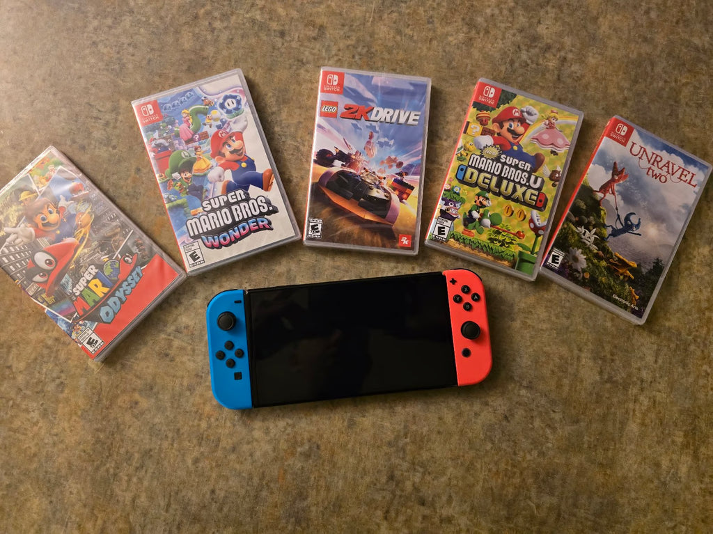 Nintendo Switch oled console with games 2P69