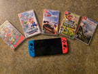 Nintendo Switch oled console with games 2P69