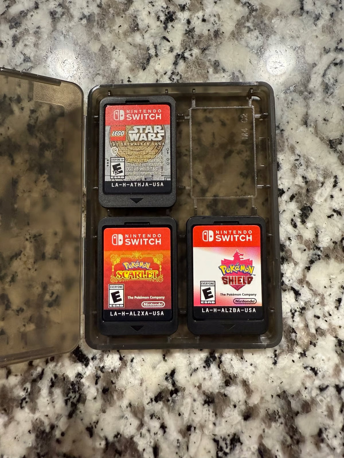 Nintendo Switch OLED + Games + Case 7P83