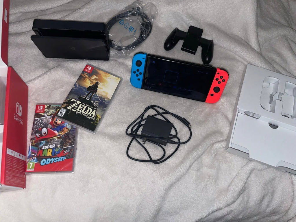 Nintendo switch oled + Two Games 7M37