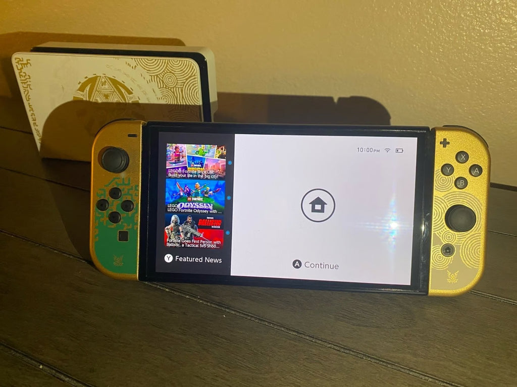 OLED Nintendo Switch - Legend of Zelda: Tears of the Kingdom Edition + 2 GAMES 2W58