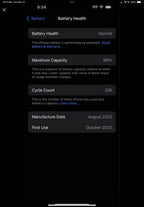 Unlocked blue IPhone 15 with pink wireless charging otter box case 8Y38