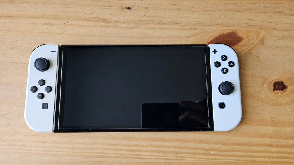 Nintendo Switch OLED + 2 Pokemon Games 3W88