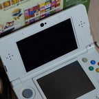 RARE New Nintendo 3DS W/ Animal Crossing No. 68 Plates W/ 32GB, Charger & Games